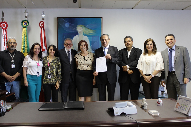Equipe do TCEMG comemorou os 99% de adequação de suficiência das evidências e de veracidade dos fatos narrados e registrados (Foto: Thiago Rios Gomes)